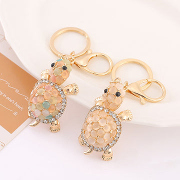 Cat Eye Stone Turtle Rhinestone Keychain Cream Multicolor
