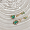 Gold Tone Green Flower Oval Stone And Clear Halo Drop Earrings view 3