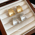 Wide Brushed Hoop Earrings In Gold And Silver Tones view 3