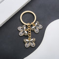 Black Butterfly Enamel Charm Keychain with Gold Tone Hardware view 1