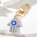 Gold Tone Colorful Hamsa Evil Eye Clip Keychains in Nine Colors view 12