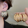Layered Ribbed Metal Dome Stud Earrings in Two Finishes view 1
