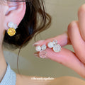 Pearl And Crystal Stud Earrings In Three Flower Colors view 2