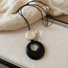 Cream Disc Black