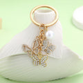 Butterfly Charm Keychains Featuring Butterfly Across 34 Pictured Variations view 1