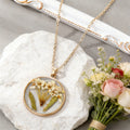 Gold Tone Round Pressed Flower Pendant Necklaces in Fourteen Designs view 12