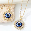 Gold Tone Crystal Sun Blue Evil Eye Pendant Necklaces in Two Designs view 1