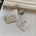 Textured Diamond Drop Earrings with Raised Floral Motifs view 7