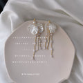 Gold Tone Translucent White Flower Multi Chain Pearl Tassel Earrings view 4
