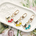 Crescent Moon Cat Dried Flower Resin Keychains 3 Colors view 1