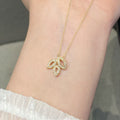 Crystal Leaf Pendant Necklace in Gold Tone Polished Metal Jewelry view 3