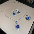 Silver Blue Oval Halo Necklace Earrings And Ring Set view 6