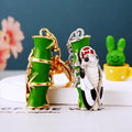 Cicada and Bamboo Keychains in Gold and Silver Tone Finishes view 3
