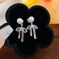 Pearl Bow Drop Earrings with Silver Tone Chain Tassels view 6