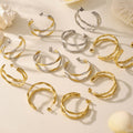 Twisted Double Hoop Earrings in Gold Silver and Two Tone view 4