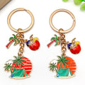 Four Orange Camping Beach and Palm Tree Metal Keychain Designs view 1