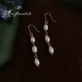 Gold Tone Triple Baroque Pearl Long Drop Hook Earrings view 3
