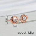 Rose Gold Swirl Frame Clear Center Stone Stud Earrings view 4