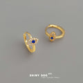 Gold Blue Crystal Evil Eye Mini Huggie Hoop Earrings view 4