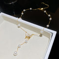 Butterfly and Pearl Drop Necklaces in Gold and Silver Tone view 6