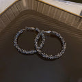 Crystal Textured Hoop Statement Earrings in Black and Silver view 6