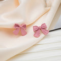 Pink and White Painted Ribbon Bow Small Stud Earrings view 3