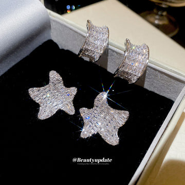 Silver Tone Pavé Star Stud Earrings In Two Silhouettes
