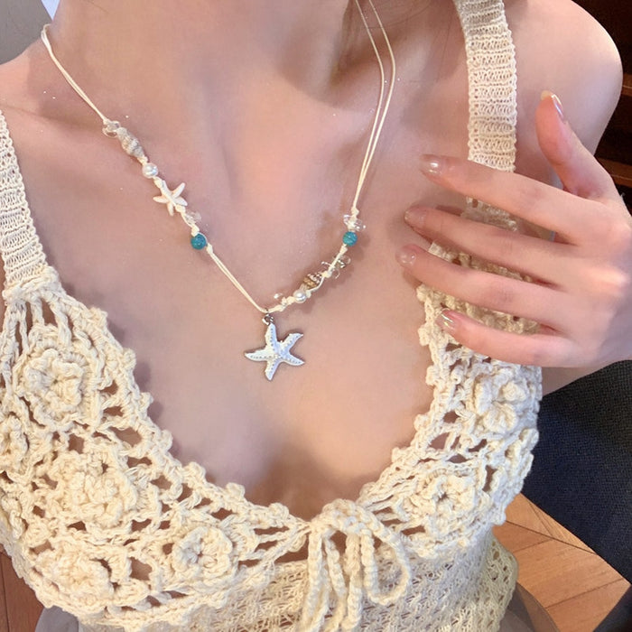 Gold Tone Starfish Shell And Pearl Pendant Necklace