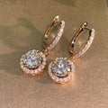 Round Clear Solitaire Halo Hinged Drop Earrings In Three Tones view 1