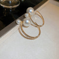 Gold Tone Double Hoop Earrings With Pearl Studs With Polished Metal Tone Details view 6