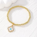 Gold Tone Beaded Crystal Evil Eye Flower Star and Cross Bracelets view 3