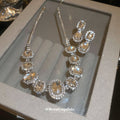 Silver Tone Champagne And Clear Oval Crystal Collar Necklace Earring Set view 2