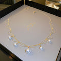 Gold Multi Strand Scalloped Chain White Pearl Drop Necklace view 6