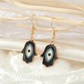 Gold Tone Black Enamel Hamsa Eye Necklace and Hook Earrings view 3