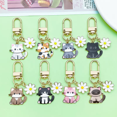 Image 1 showing a bunch of key chains with different animals.