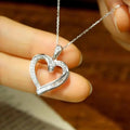 Silver Tone Open Heart Pendant Necklace with Clear Crystal Edge view 2