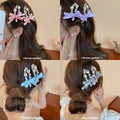 Crystal Bow Duckbill Hair Clip In Pink Or White With Teardrop Fringe view 1