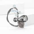Faceted Glass Flower Brooch with Curved Crystal Stem view 2