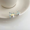 Silver Tone Pale Blue Bow And Large Pearl Like Stud Earrings view 6
