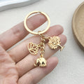 Gold-Tone Elephant Keychain With Lotus And Tree Charms view 3