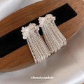 Pearl Bow and Chain Tassel Earrings Statement Jewelry Design view 2