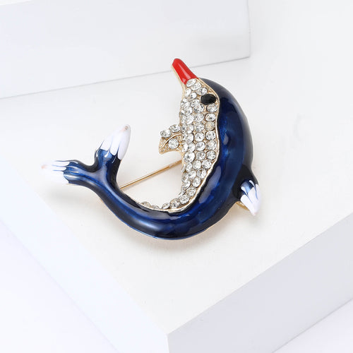 Front view of the blue dolphin brooch