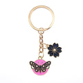 Gold Tone Butterfly Skull and Sakura Flower Clip Keychains view 8