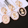 Pearl Framed Cameo Woman Keychains in White Pink and Black view 2