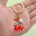 Cherry Keychain With Round Bead In Four Red And Black Styles view 2
