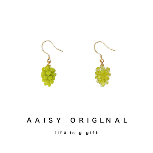 Gold-tone yellow-green grape-cluster hooks in the first product display.