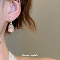 Gold Tone Pink Gourd Pearl Drop Earrings with Leaf Detail view 3