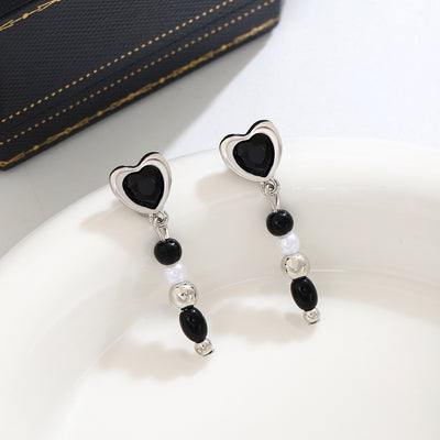 Primary supplied view of black heart bead earrings