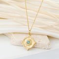 Gold Tone Vintage Eye and Symbol Medallion Necklaces in Thirteen Designs view 9