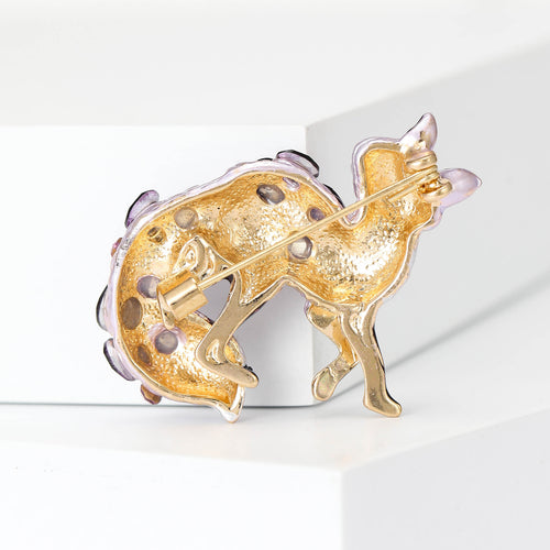 Gold reverse of purple fox brooch showing pin clasp hardware